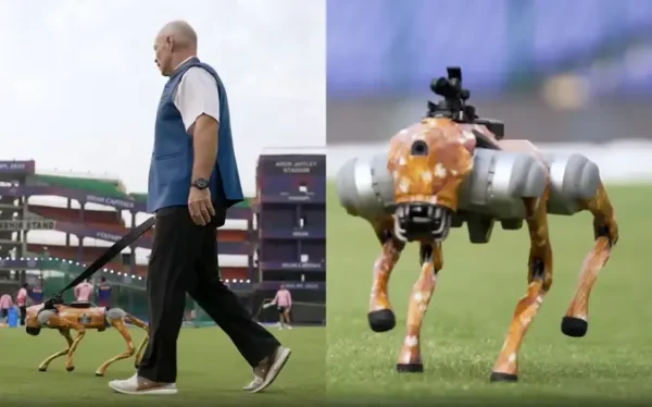 Robot Dog with commentator Danny Morrison