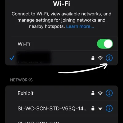 iPhone displaying the Wi-Fi settings with the connected network highlighted.