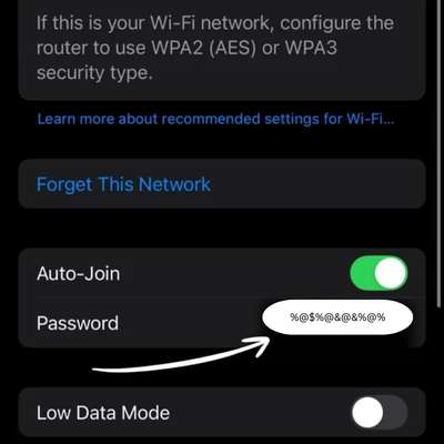 iPhone showing the Wi-Fi password after Face ID or passcode authentication.