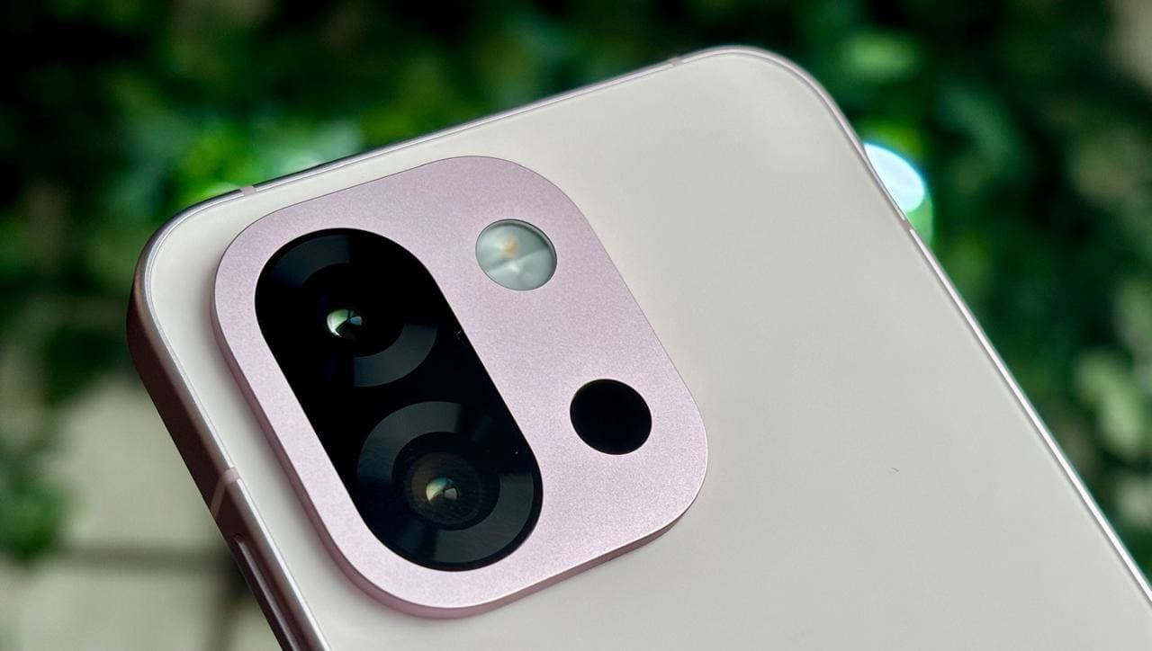 Dual rear camera system of the OnePlus 13s highlighting its main and telephoto lenses