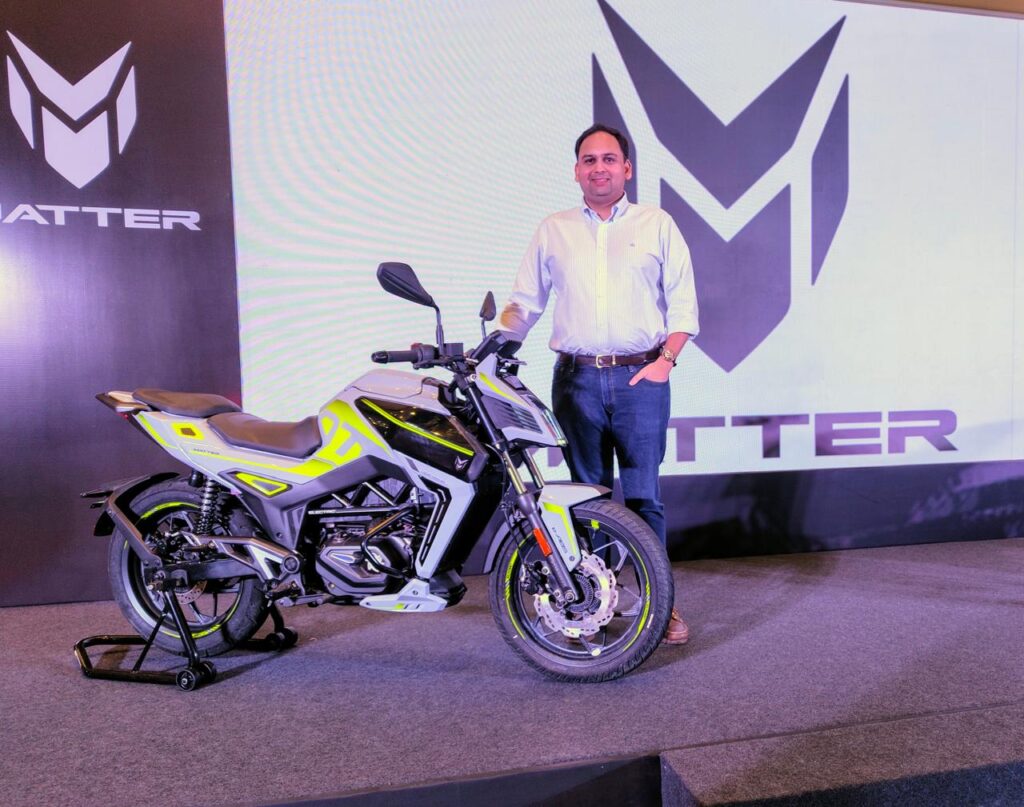 Mohal Lalbhai standing beside AERA 5000+